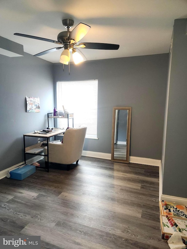 home office featuring ceiling fan and dark hardwood / wood-style flooring