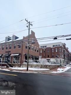 view of snow covered property