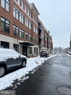 view of snow covered building