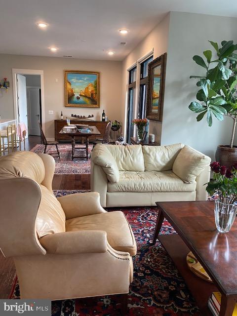 living room with wood-type flooring