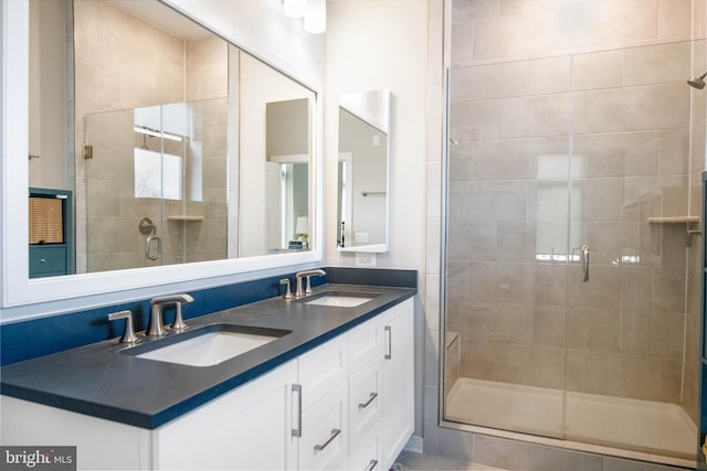 2 Stationmaster St SE Unit 302, Leesburg, VA 20175 - full bathroom with double vanity, a shower stall, and a sink