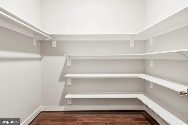 2 Stationmaster St SE Unit 302, Leesburg, VA 20175 - spacious closet featuring wood finished floors