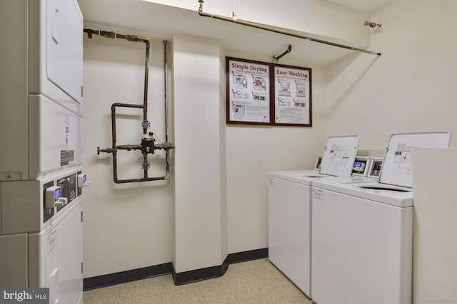 laundry room featuring stacked washing maching and dryer and washer and dryer