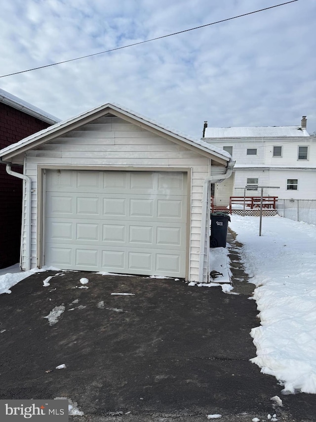 view of snow covered garage