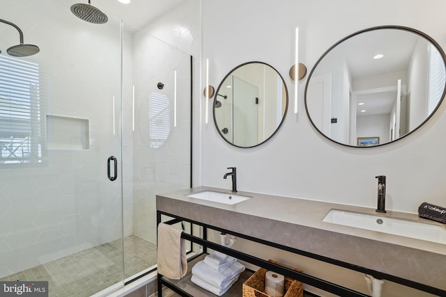 bathroom with vanity and an enclosed shower