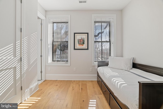 sitting room with light hardwood / wood-style floors