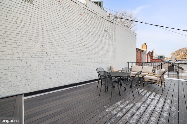 deck featuring an outdoor living space