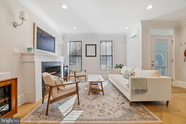 living room with ornamental molding, a premium fireplace, and light parquet floors