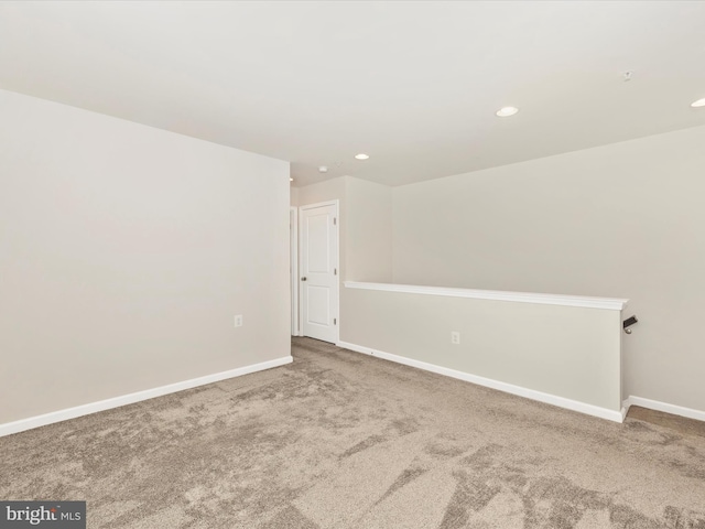 spare room with carpet flooring