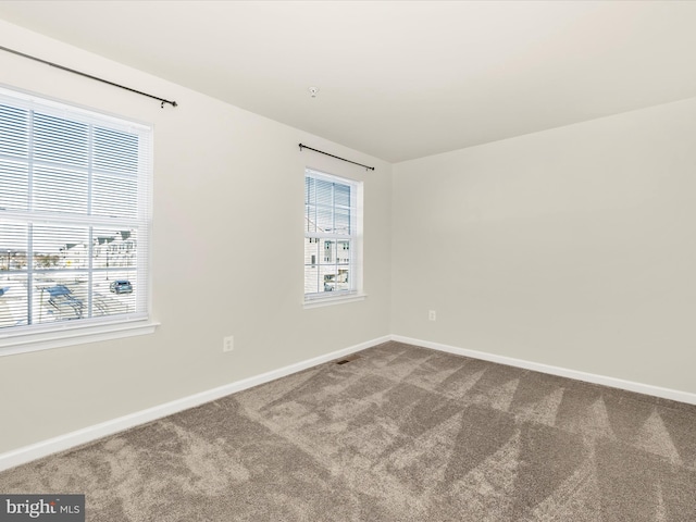 view of carpeted spare room