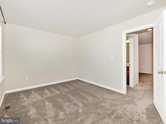 unfurnished room with carpet