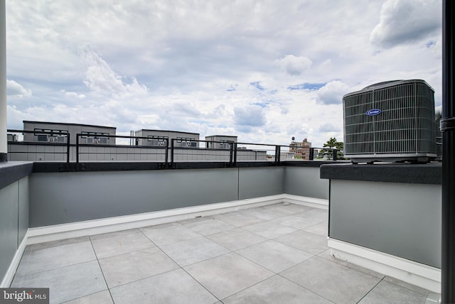 view of patio / terrace featuring a balcony and cooling unit