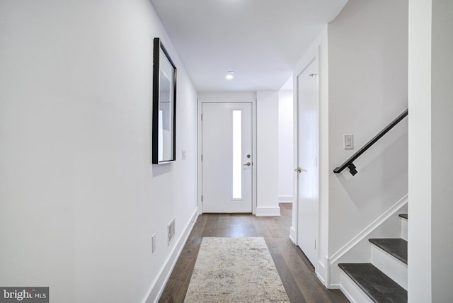 doorway to outside featuring dark hardwood / wood-style flooring