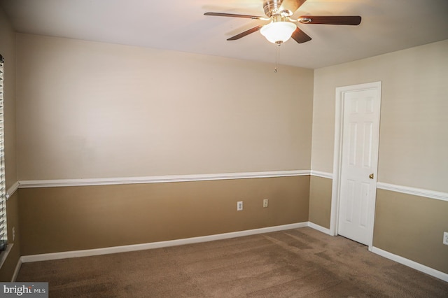 empty room featuring carpet floors and ceiling fan