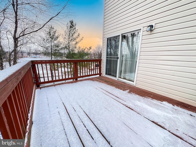 view of snow covered deck