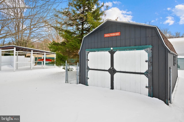 view of snow covered garage