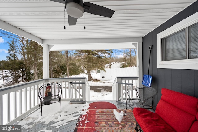 snow covered deck with ceiling fan