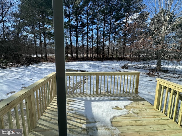 view of snow covered deck