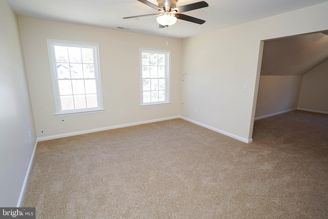 empty room with light carpet and ceiling fan