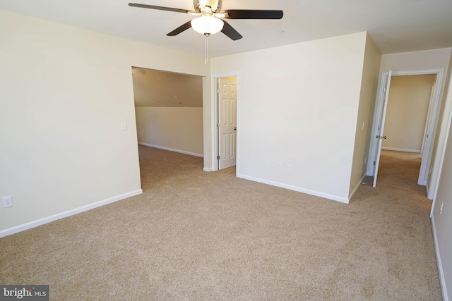 carpeted empty room with ceiling fan