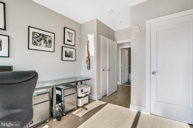 office space featuring light hardwood / wood-style floors