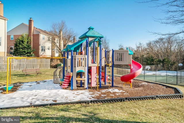 view of playground featuring a lawn