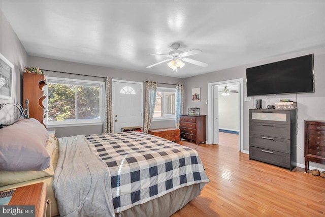 bedroom featuring light wood-type flooring and ceiling fan