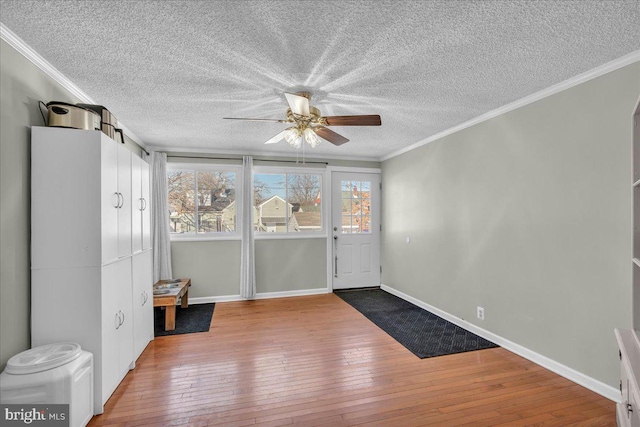 interior space featuring ceiling fan