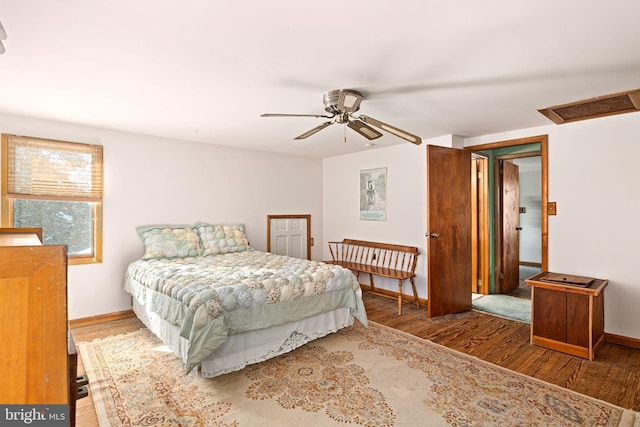 bedroom featuring ceiling fan and wood-type flooring