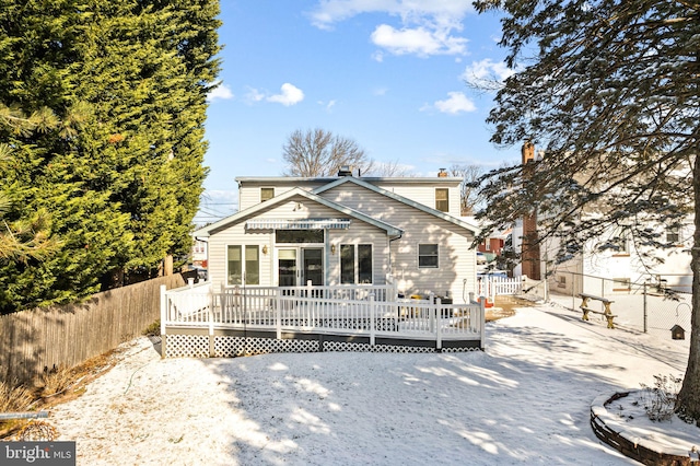 rear view of house with a deck