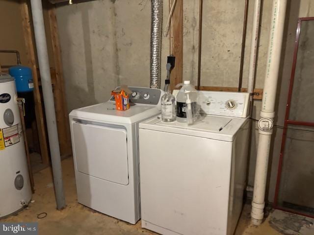 washroom with separate washer and dryer and electric water heater