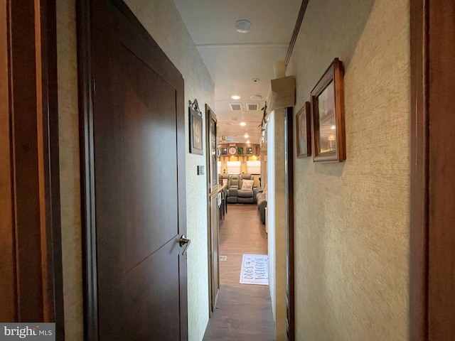 hall featuring dark wood-type flooring