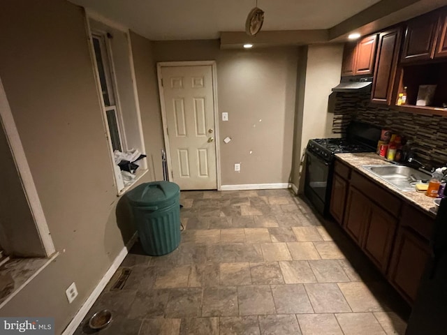 kitchen featuring decorative backsplash, sink, and black range with gas cooktop