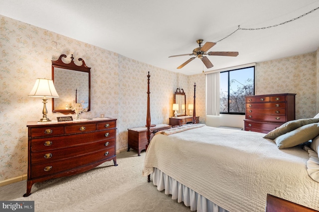 bedroom featuring light carpet and ceiling fan