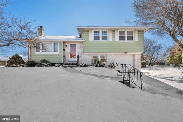 tri-level home with a garage