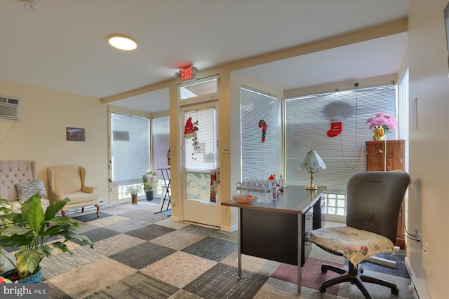 office area featuring carpet flooring and a wall mounted AC