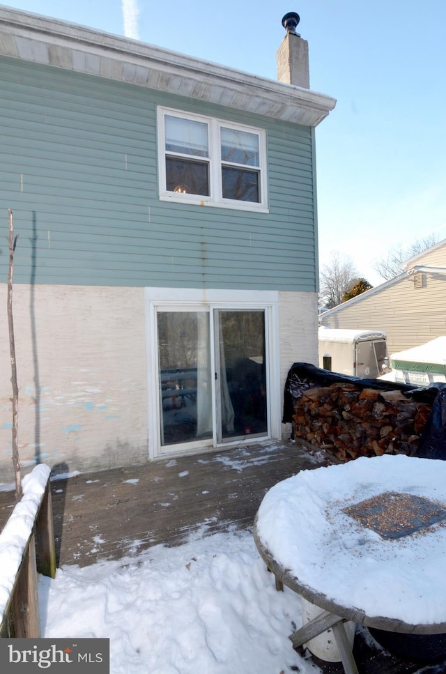 view of snow covered property