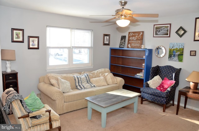 living room with ceiling fan and light carpet