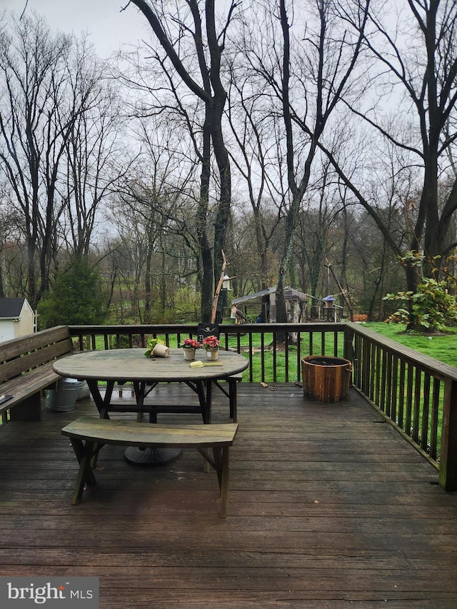 wooden deck with a playground