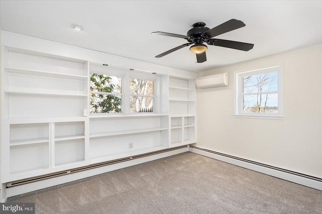 carpeted empty room featuring a wall unit AC, baseboard heating, and a ceiling fan