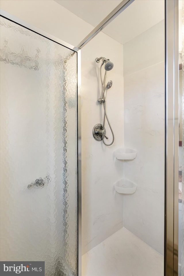 bathroom with a stall shower