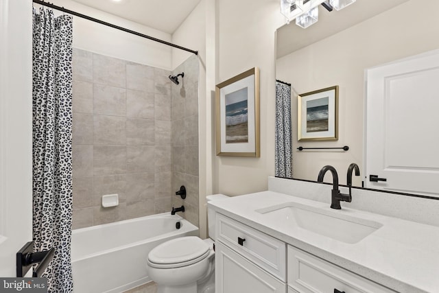 full bathroom featuring toilet, vanity, and shower / bath combo with shower curtain