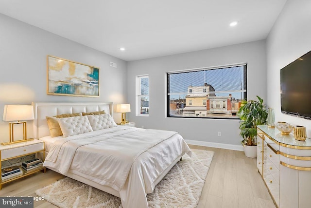 bedroom featuring light wood-type flooring