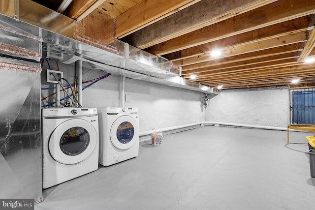 washroom featuring separate washer and dryer