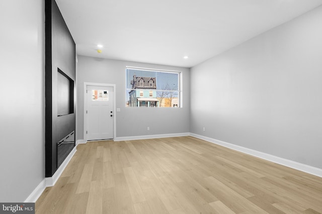 foyer with light wood-type flooring