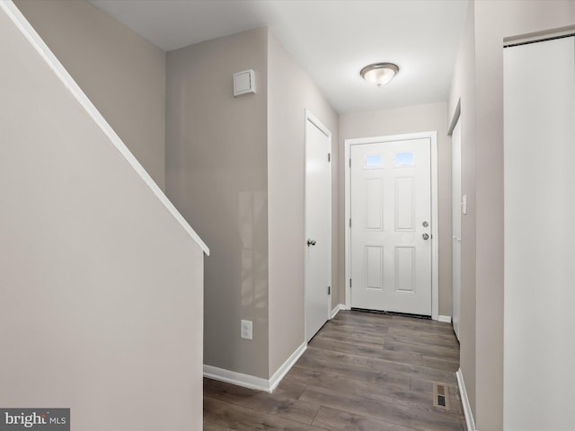 doorway featuring wood-type flooring