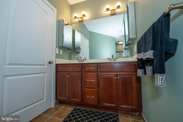 bathroom with vanity and tile patterned floors