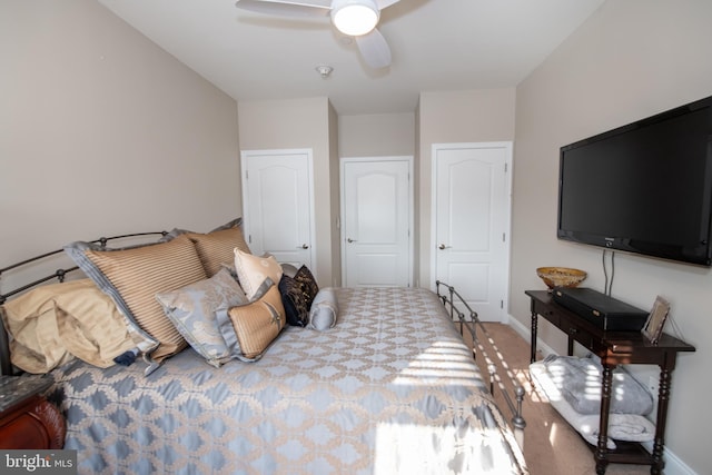 carpeted bedroom featuring ceiling fan