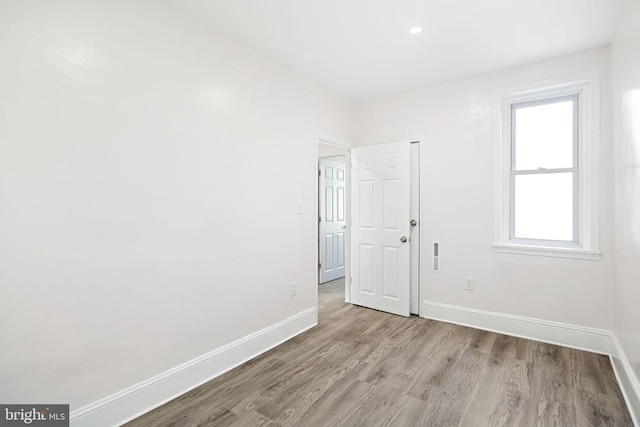 unfurnished room featuring light wood-type flooring