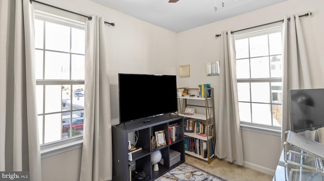 interior space featuring ceiling fan